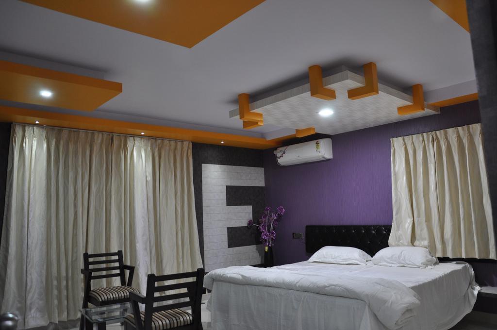 Hotel Av Comforts Bangalore Quarto foto