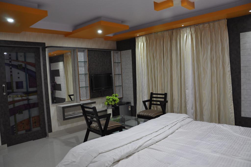 Hotel Av Comforts Bangalore Quarto foto