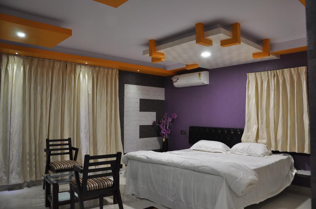 Hotel Av Comforts Bangalore Quarto foto